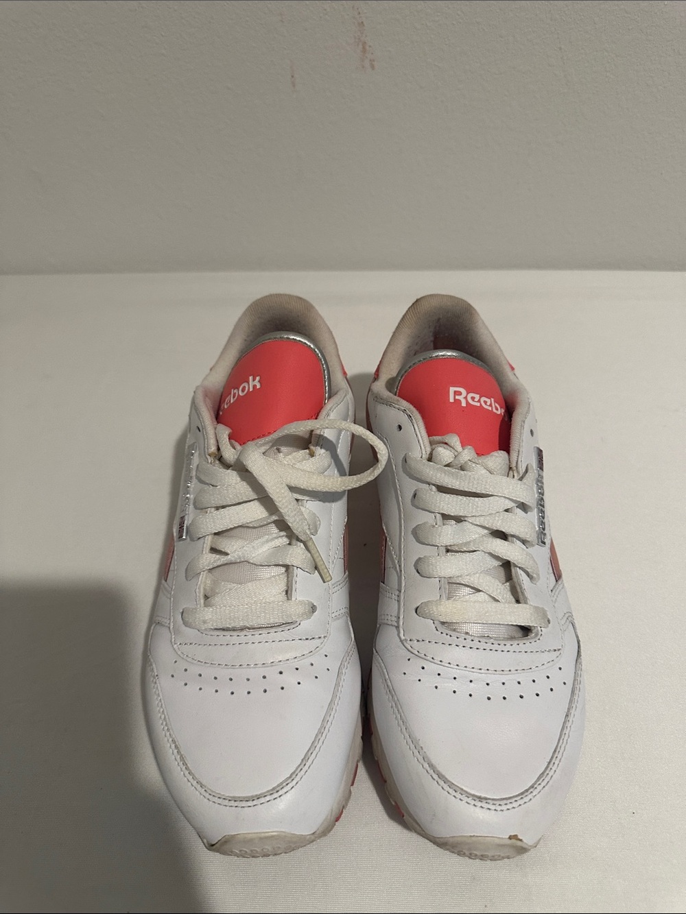 Reebok Kids White Sneakers with Coral Accents